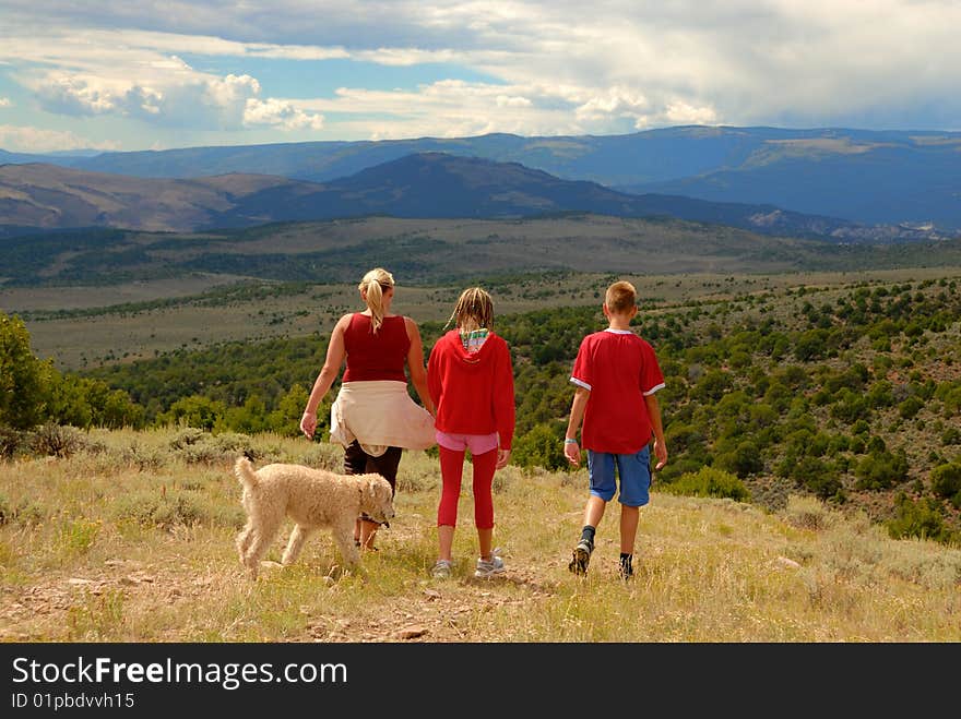 Family with dog on trip in Colorado Mountains. Family with dog on trip in Colorado Mountains.