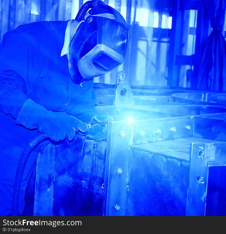 Welder at work.(industrial photo)