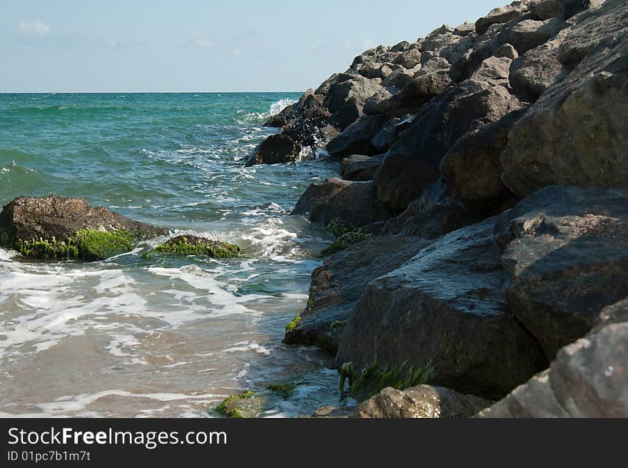 Breakwater on the bank of the black sea