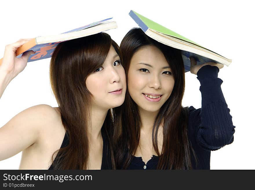 Female smiling while carrying notebook. Female smiling while carrying notebook