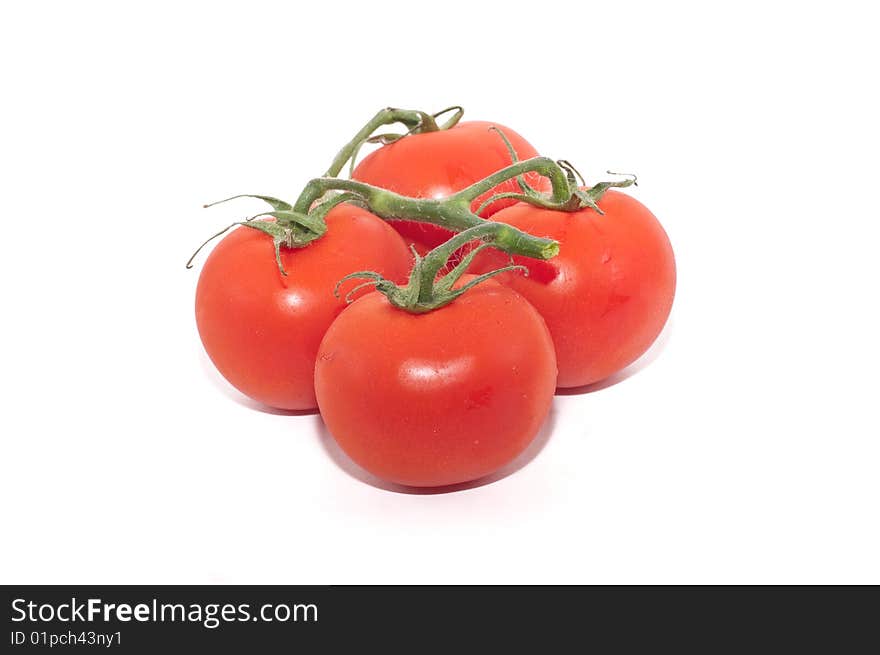 A group of cherry tomatoes isolated against a white background