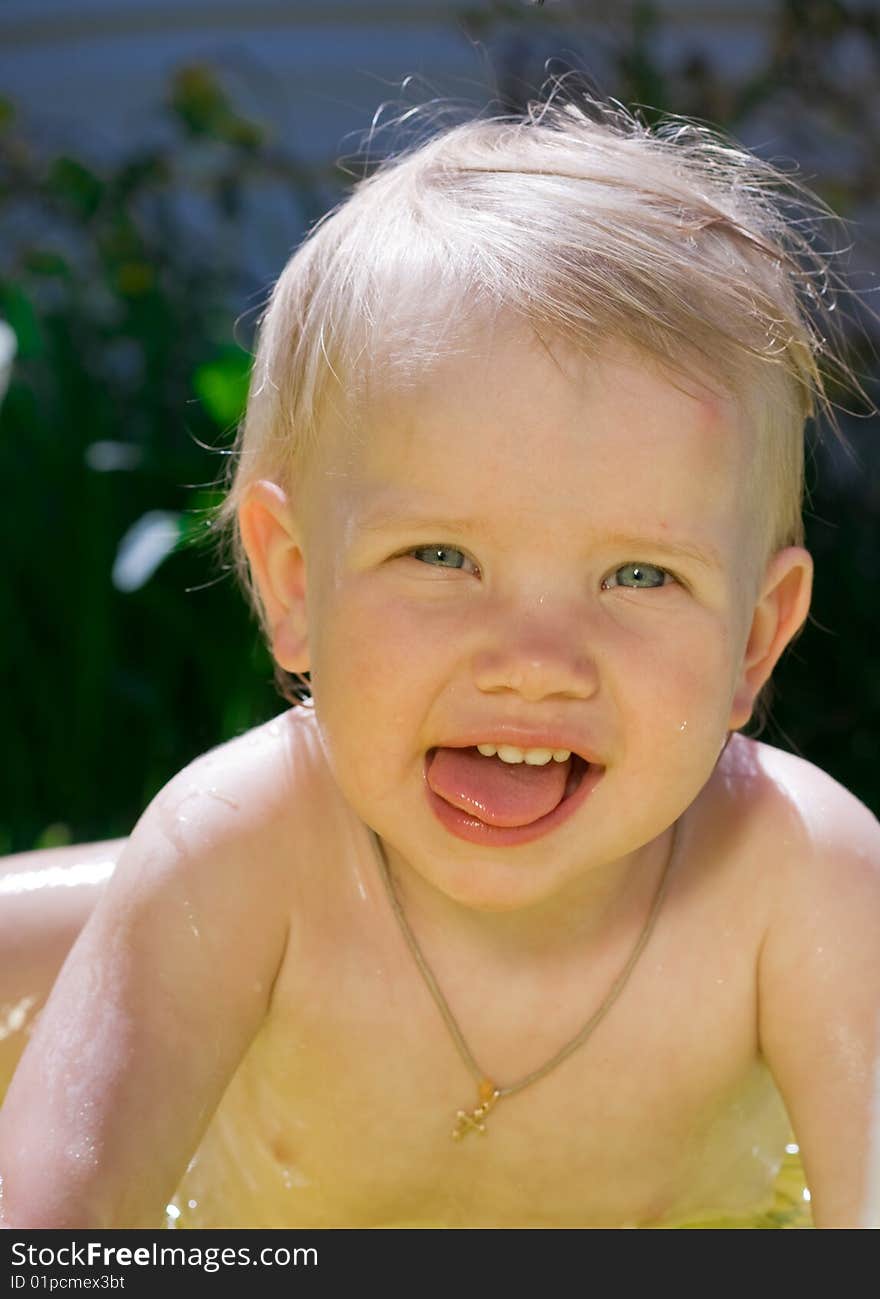 Little Girl In Yellow Pool