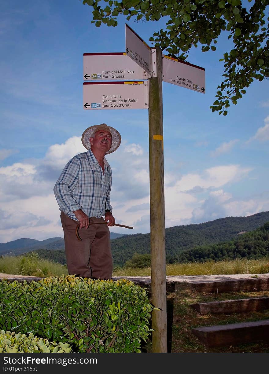 Senior man, giving directions in a forest. Senior man, giving directions in a forest