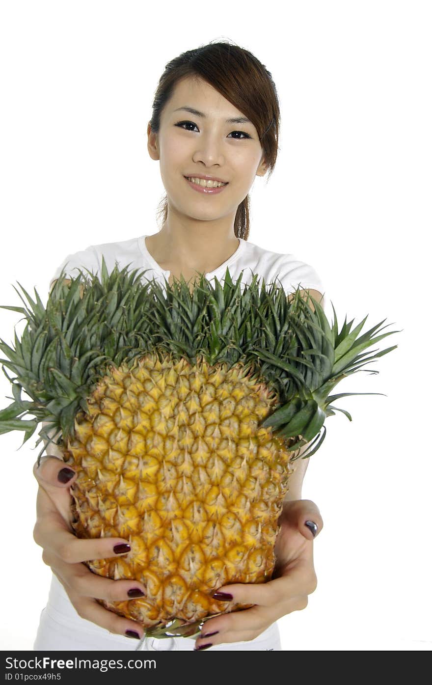 Asian young woman showing a healthy fruit. Asian young woman showing a healthy fruit