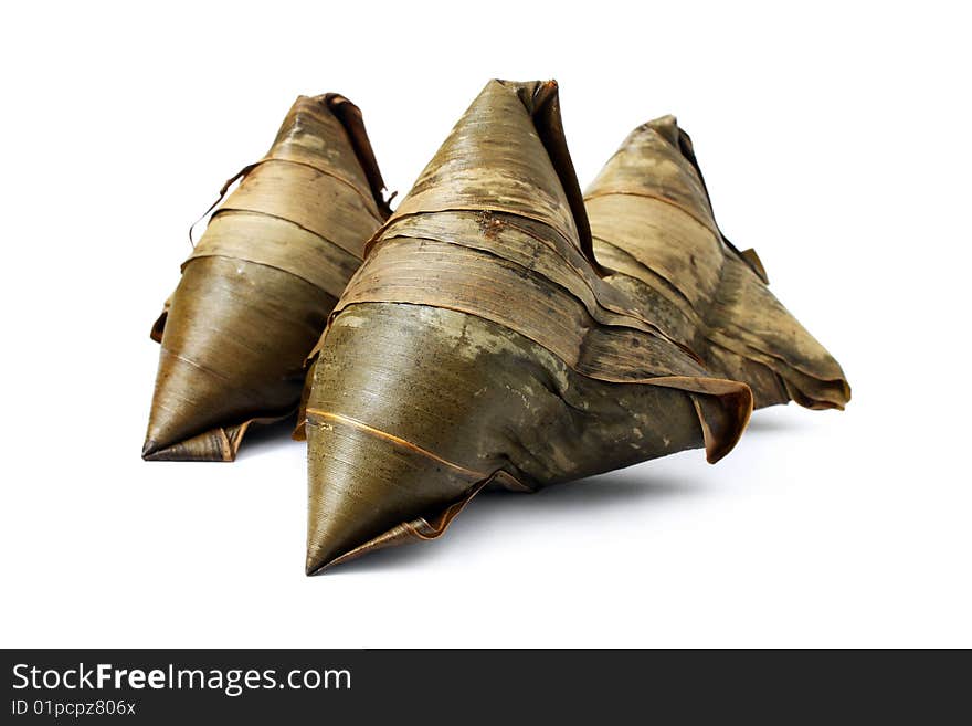 Three rice dumplings (Chinese traditional food) isolated on white background.