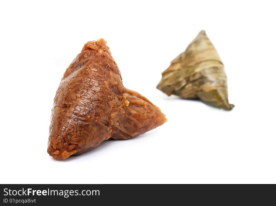 A unwrapped rice dumplings isolated from other over white background.