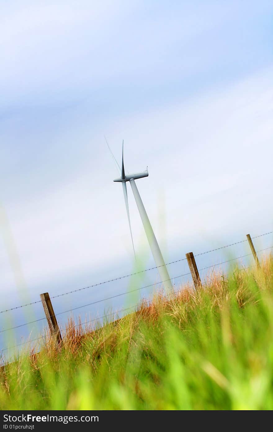 Modern windmill in the fields, springtime