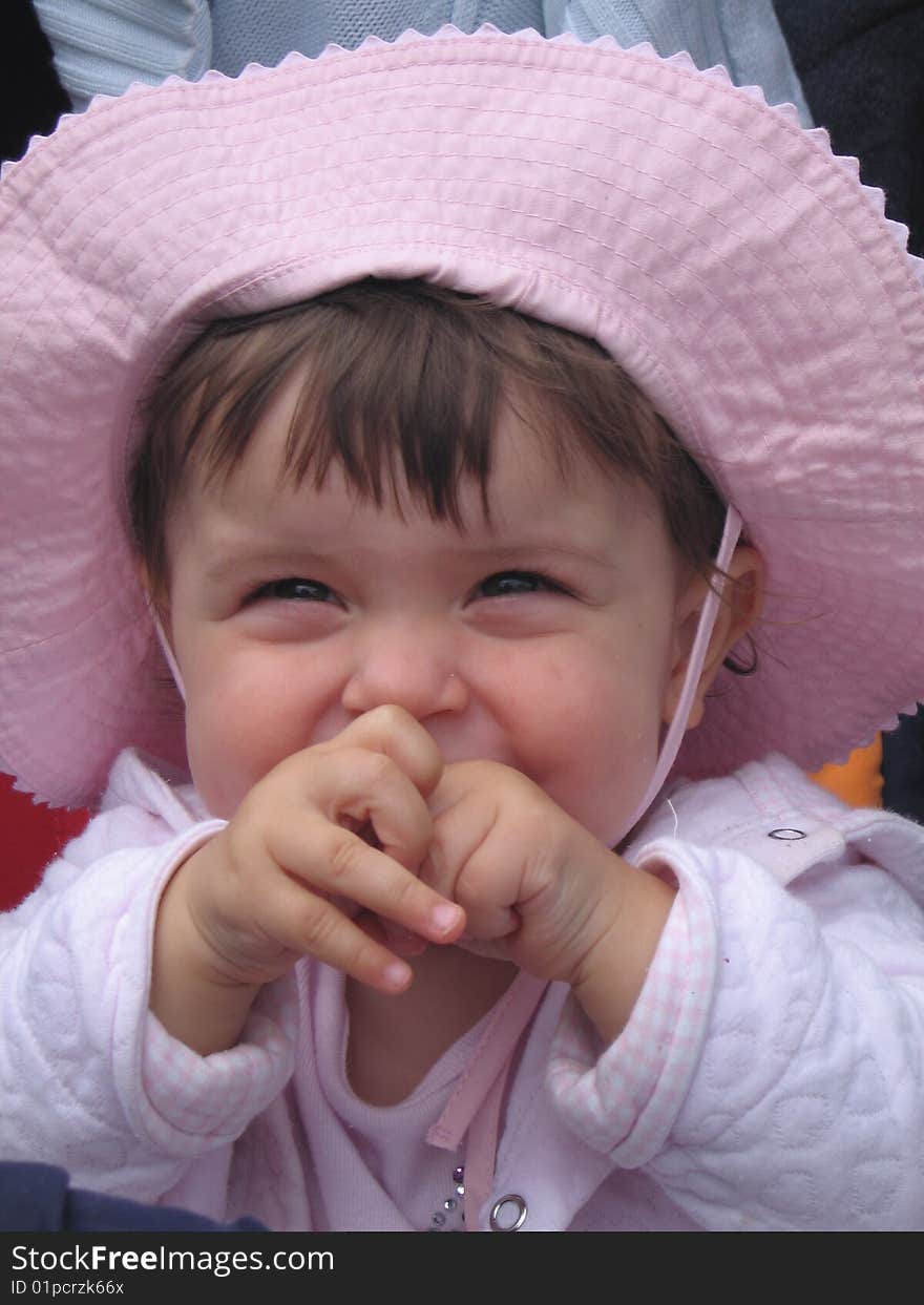 Child seen on the street in her carriage. Child seen on the street in her carriage