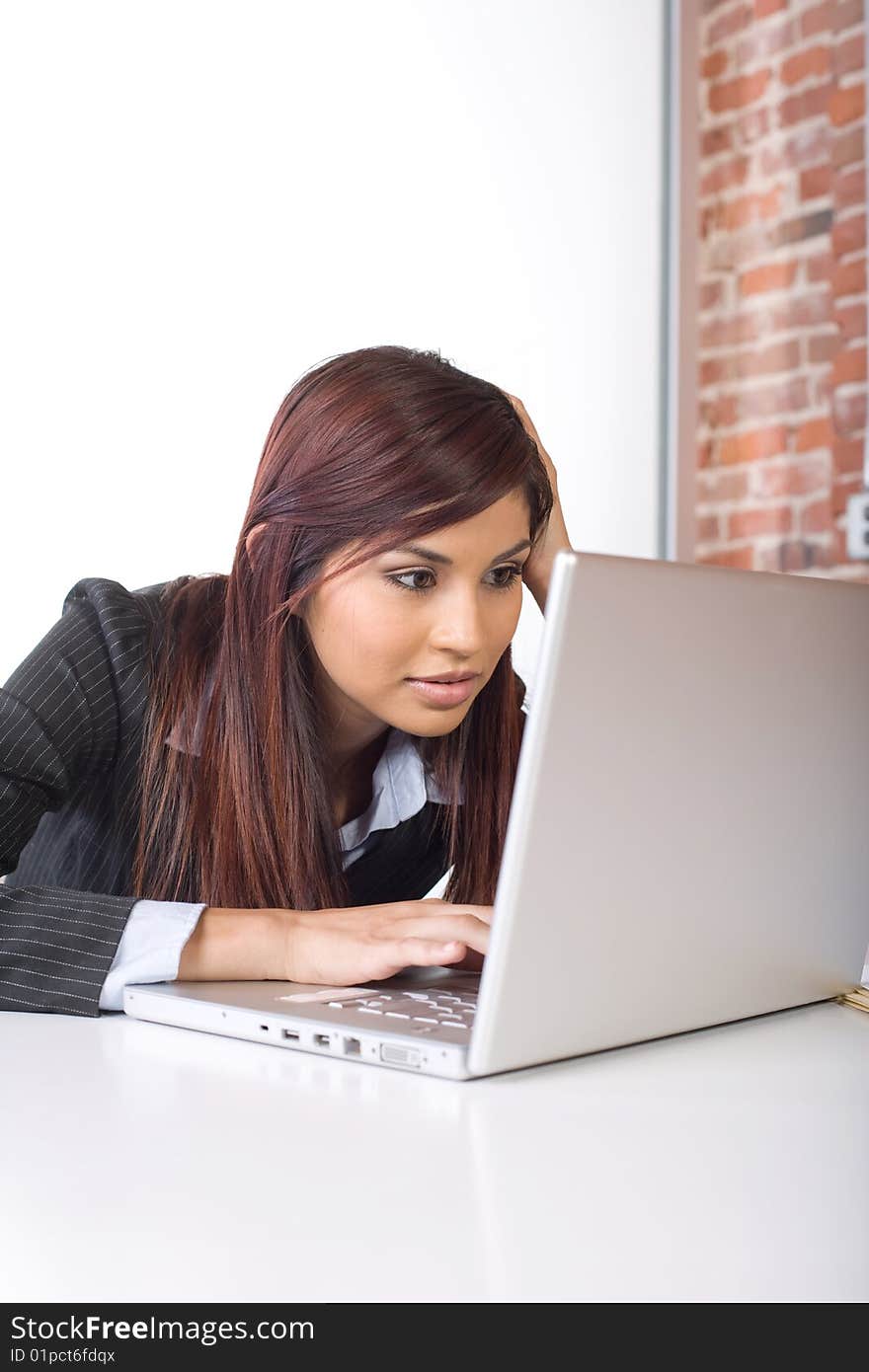 Business woman laptop in modern office