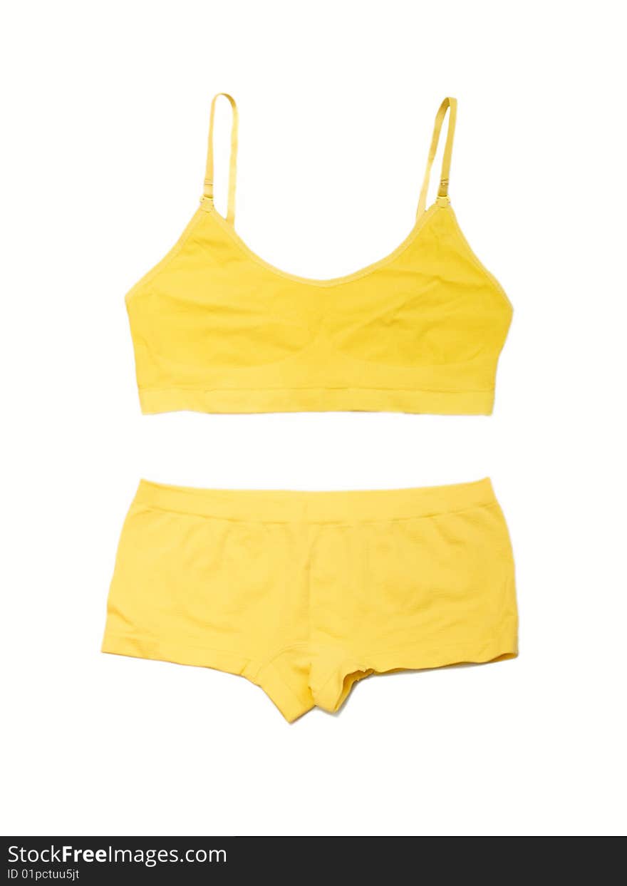 Yellow lingerie on the white background. Yellow lingerie on the white background