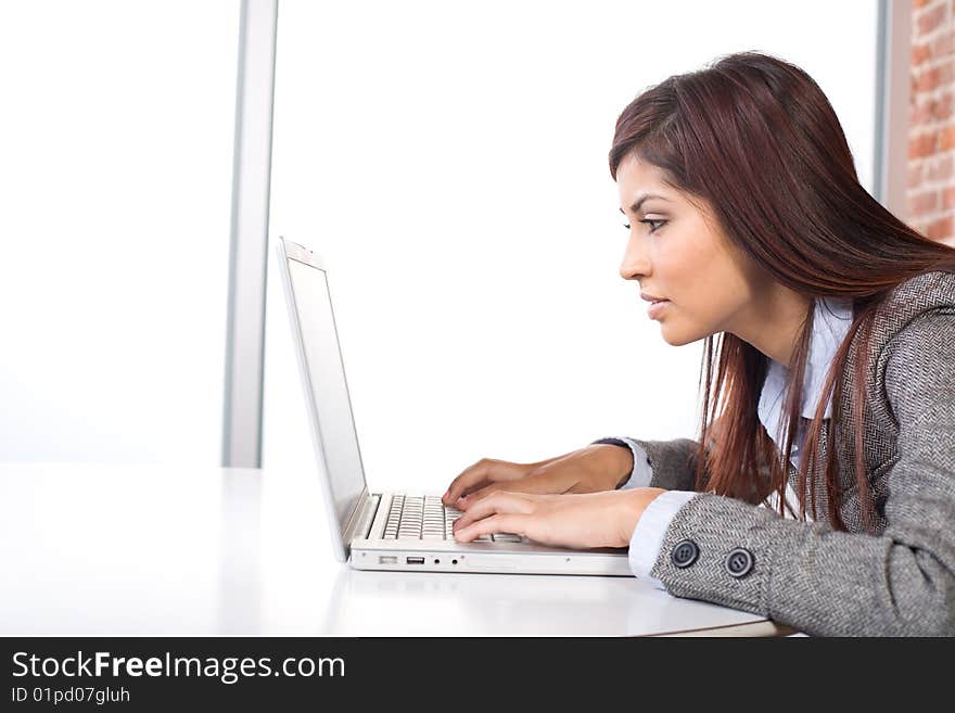 Business woman laptop in modern office