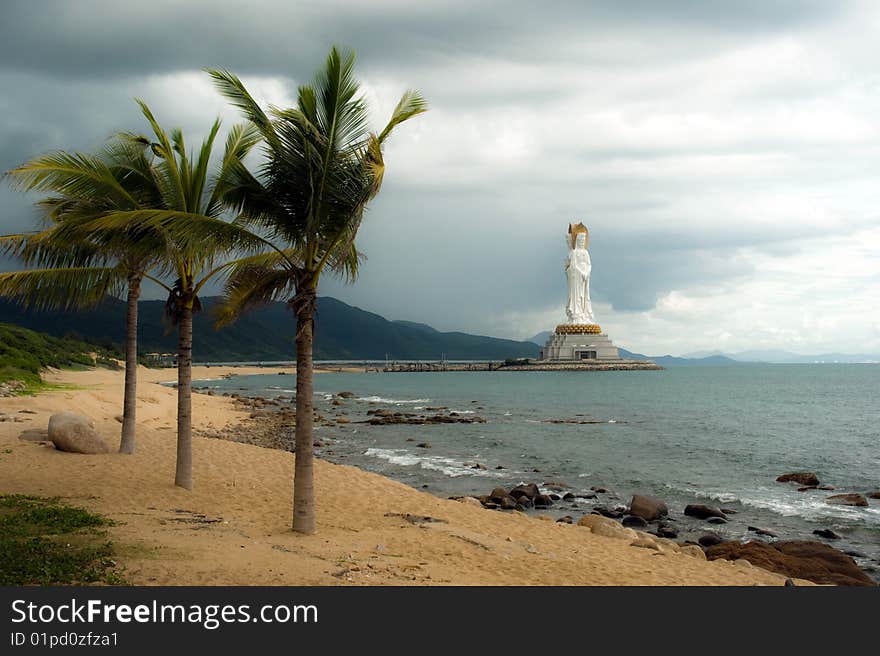 Enormous statue Budda on background storm sky