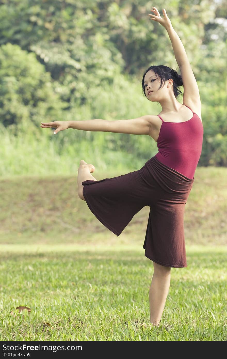 A portrait of asian female ballet dancer outdoor. A portrait of asian female ballet dancer outdoor