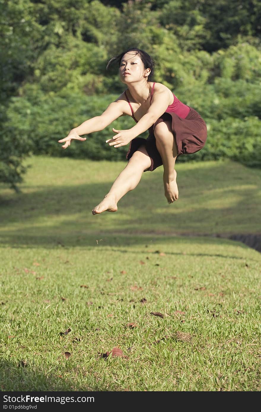 A portrait of asian female ballet dancer outdoor. A portrait of asian female ballet dancer outdoor