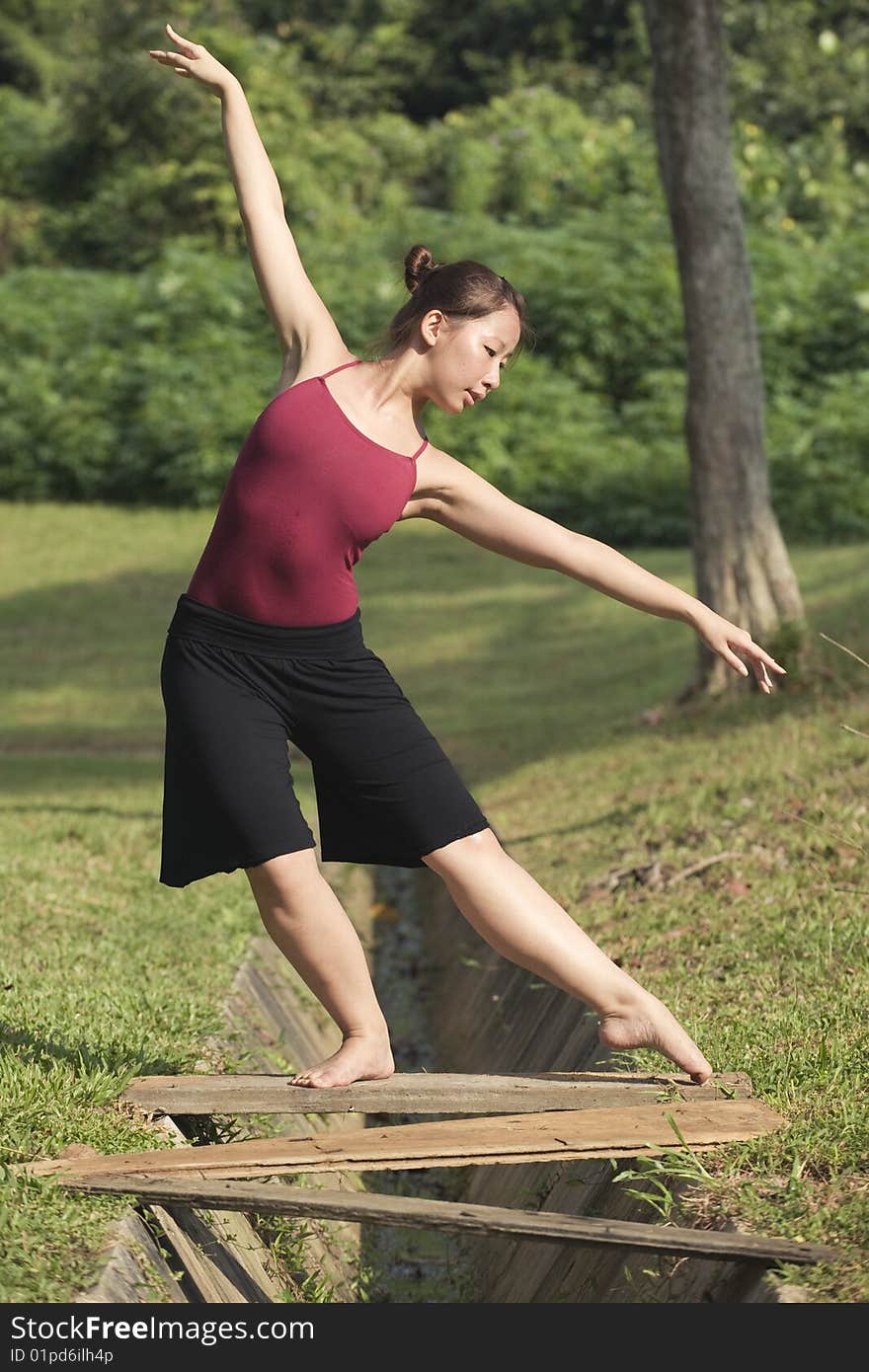 A portrait of asian female ballet dancer outdoor. A portrait of asian female ballet dancer outdoor