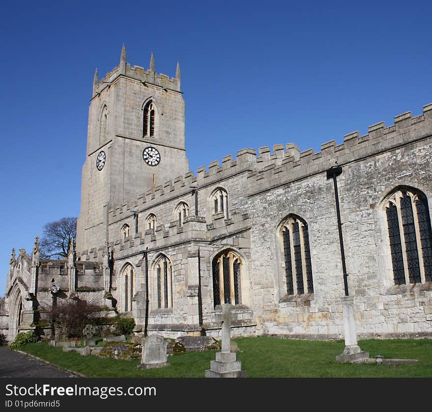 An English Village Church on a Sunny Day. An English Village Church on a Sunny Day.