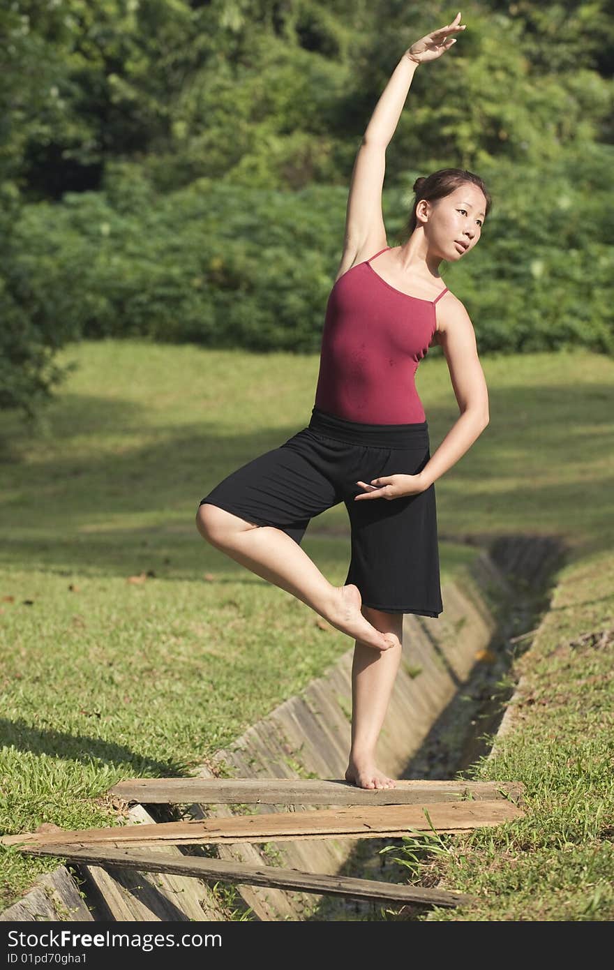 A portrait of asian female ballet dancer outdoor. A portrait of asian female ballet dancer outdoor