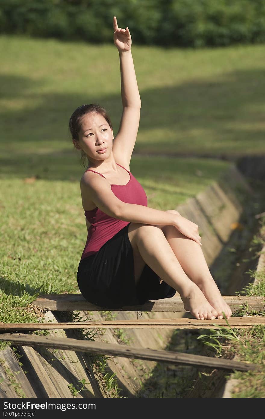 A portrait of asian female ballet dancer outdoor. A portrait of asian female ballet dancer outdoor