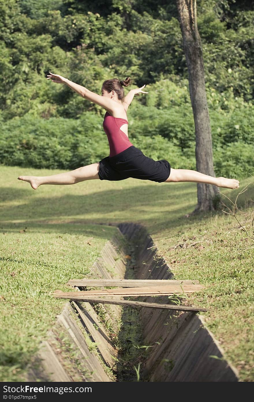 A portrait of asian female ballet dancer outdoor. A portrait of asian female ballet dancer outdoor