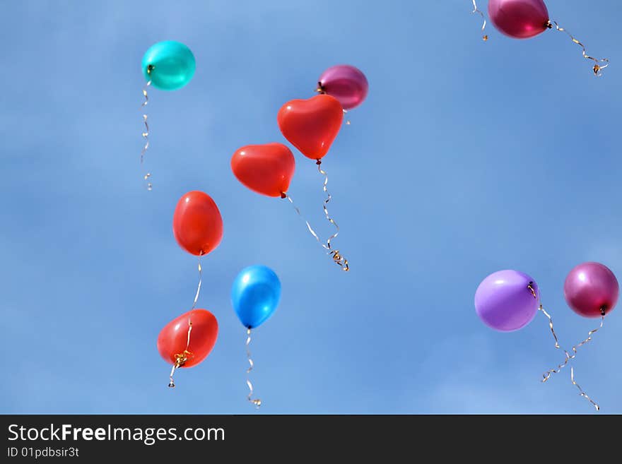 Colorful  balloons floating in the sky