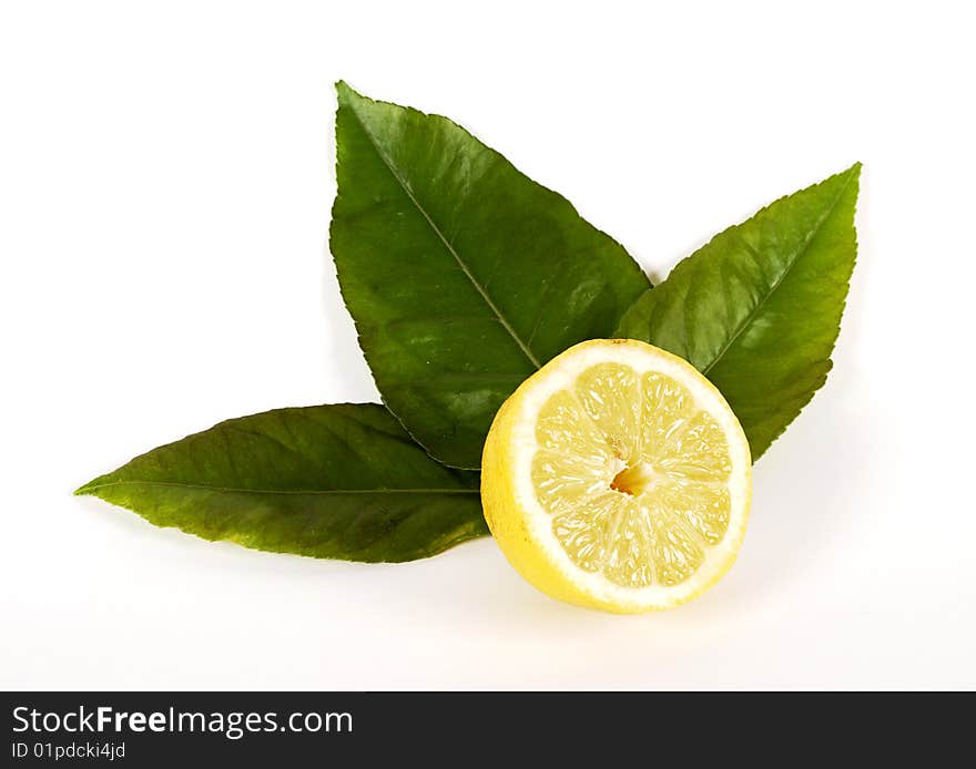 Lemon with leaves on white background. Lemon with leaves on white background