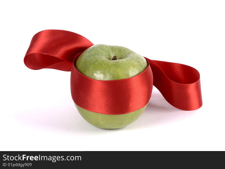 Apple with red ribbon to ninja. Apple with red ribbon to ninja