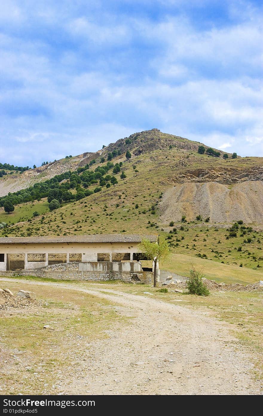 Landscape with ruins and a hill. Shot in Dobrogea (Romania)