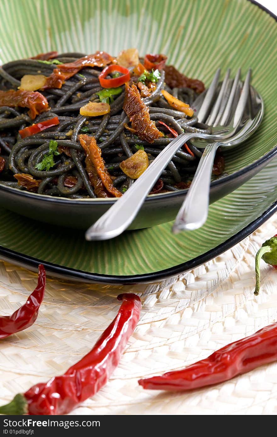 Spaghetti with chilli and dried tomatoes. Spaghetti with chilli and dried tomatoes