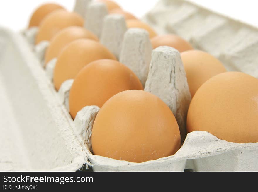 Free range eggs isolated against a white background