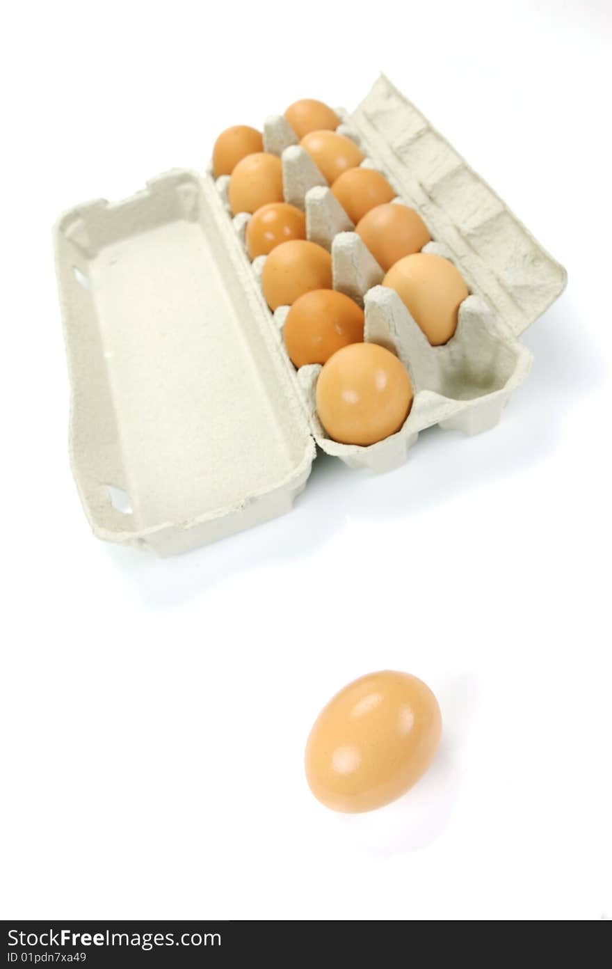 Free range eggs isolated against a white background