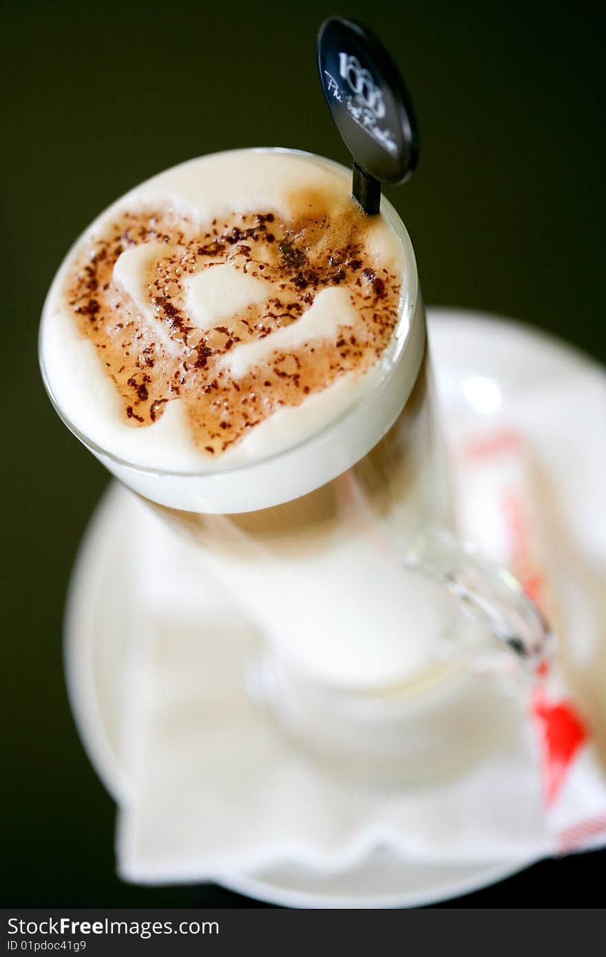 Cappuccino with a heart shape of cocoa. Cappuccino with a heart shape of cocoa