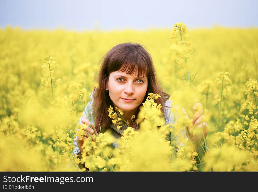 Beautiful woman in flower field. Beautiful woman in flower field