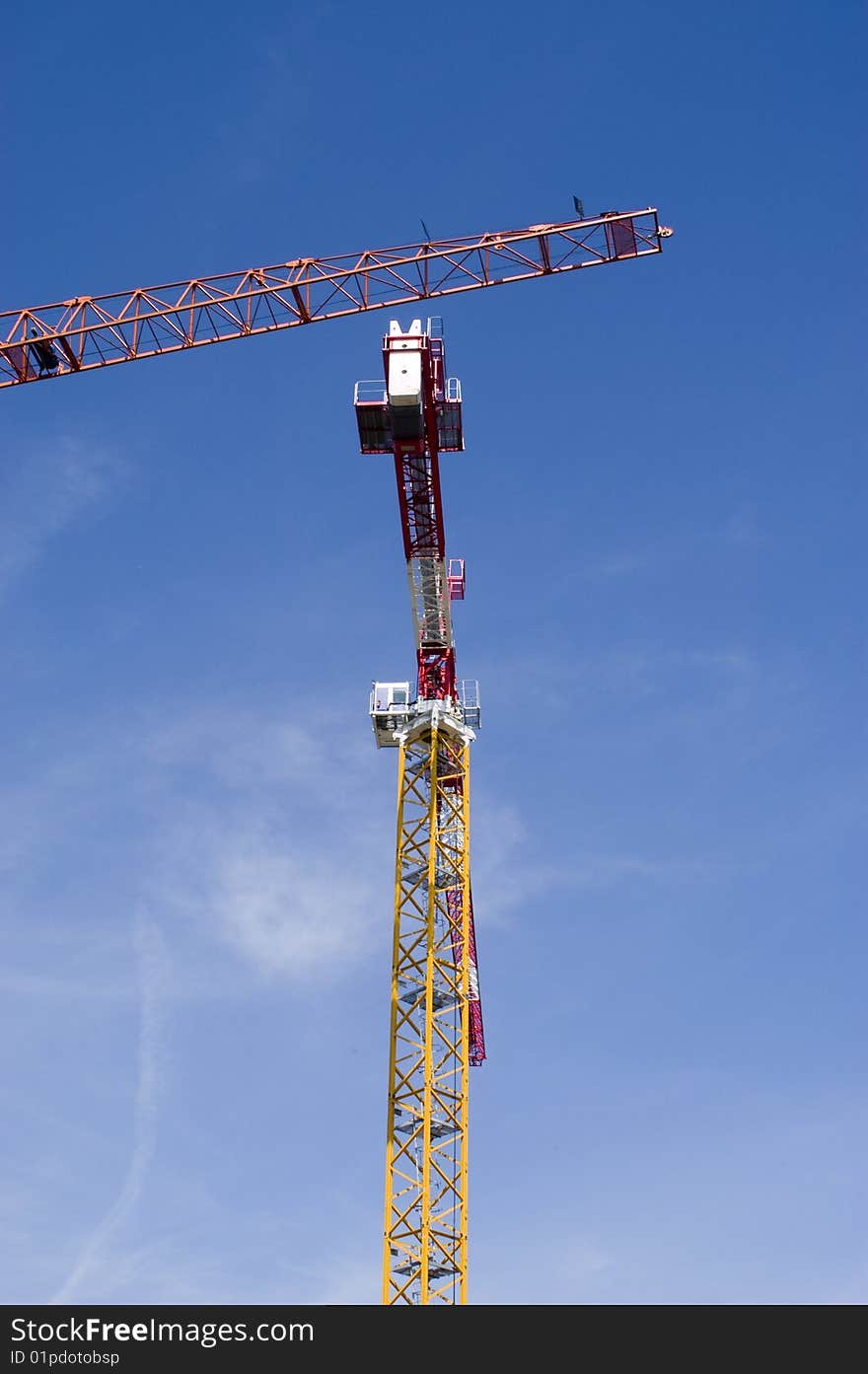 Two construction cranes