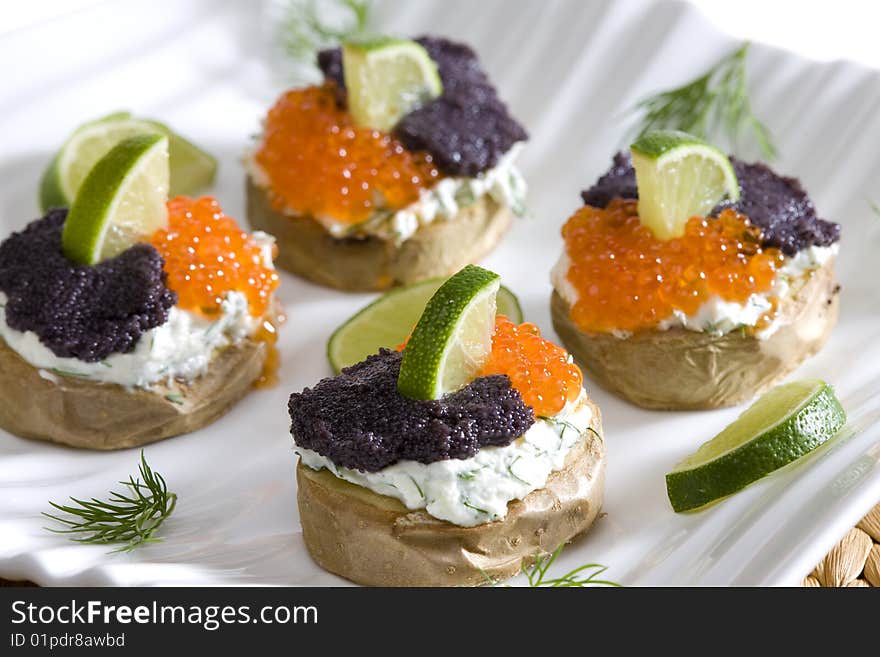 Roasted potatoes wth caviar and lime. Roasted potatoes wth caviar and lime