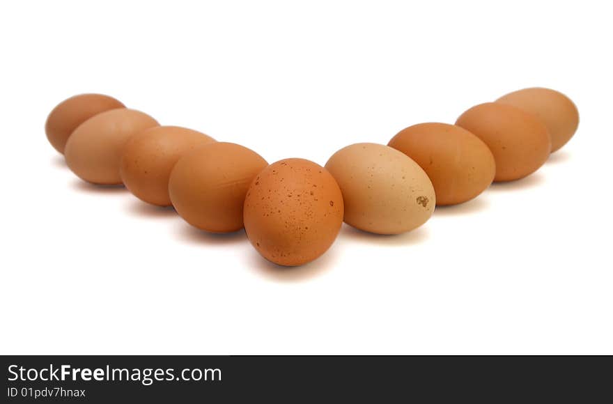 Wedge of brown eggs isolated