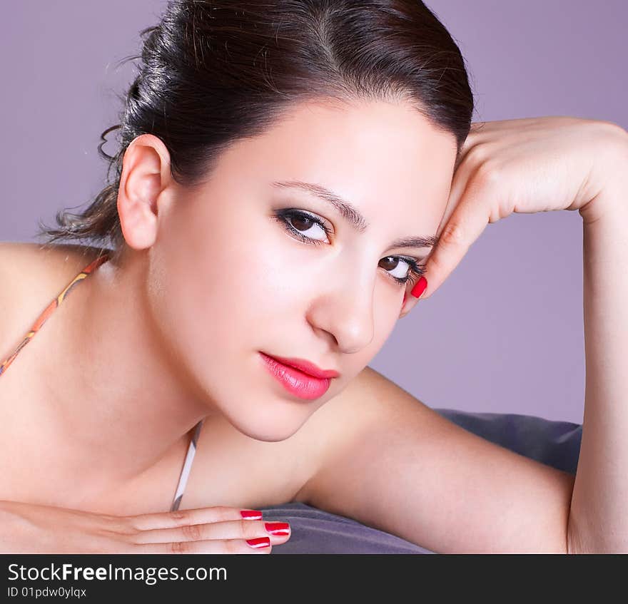 Attractive young fashion model posing , studio shot