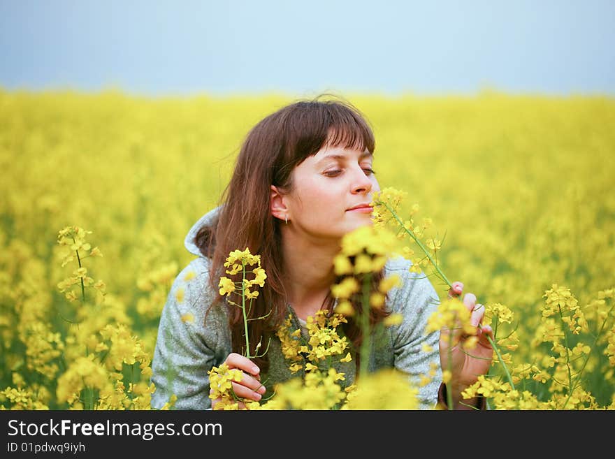 Beautiful woman in flower field. Beautiful woman in flower field