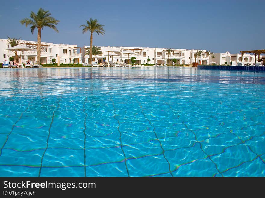 Swimming pool in tropical hotel