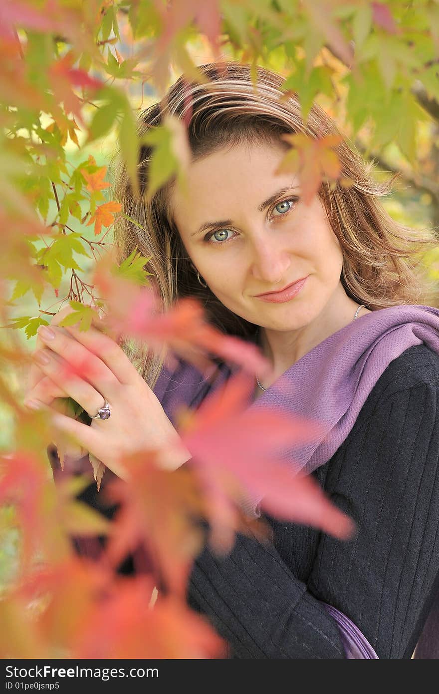 Woman With Autumn Leaf