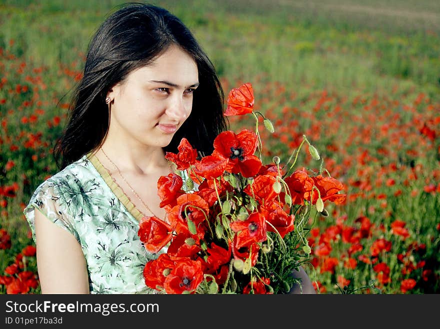 Girl On A Red Poppies Field