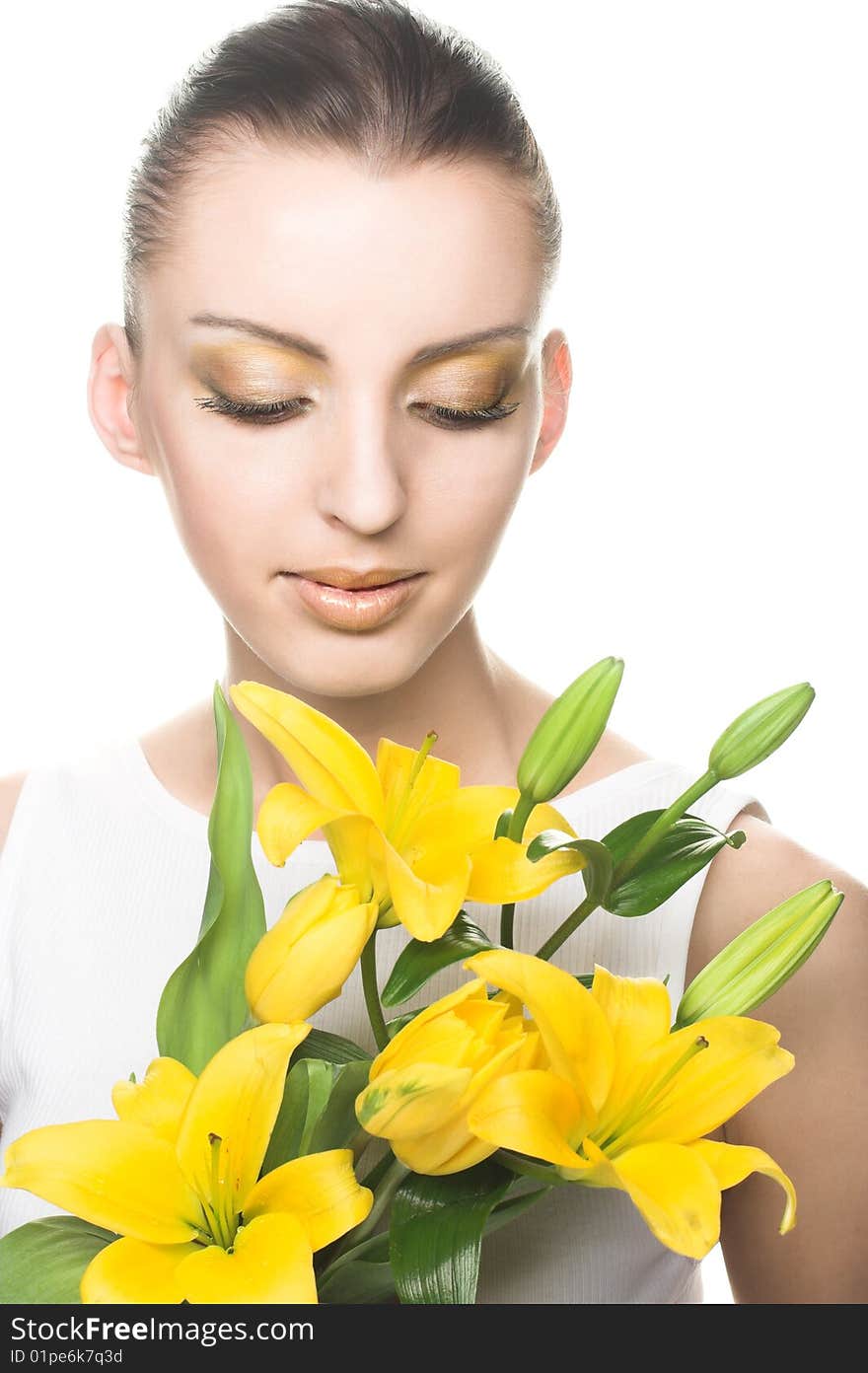 Young woman with yellow flowers