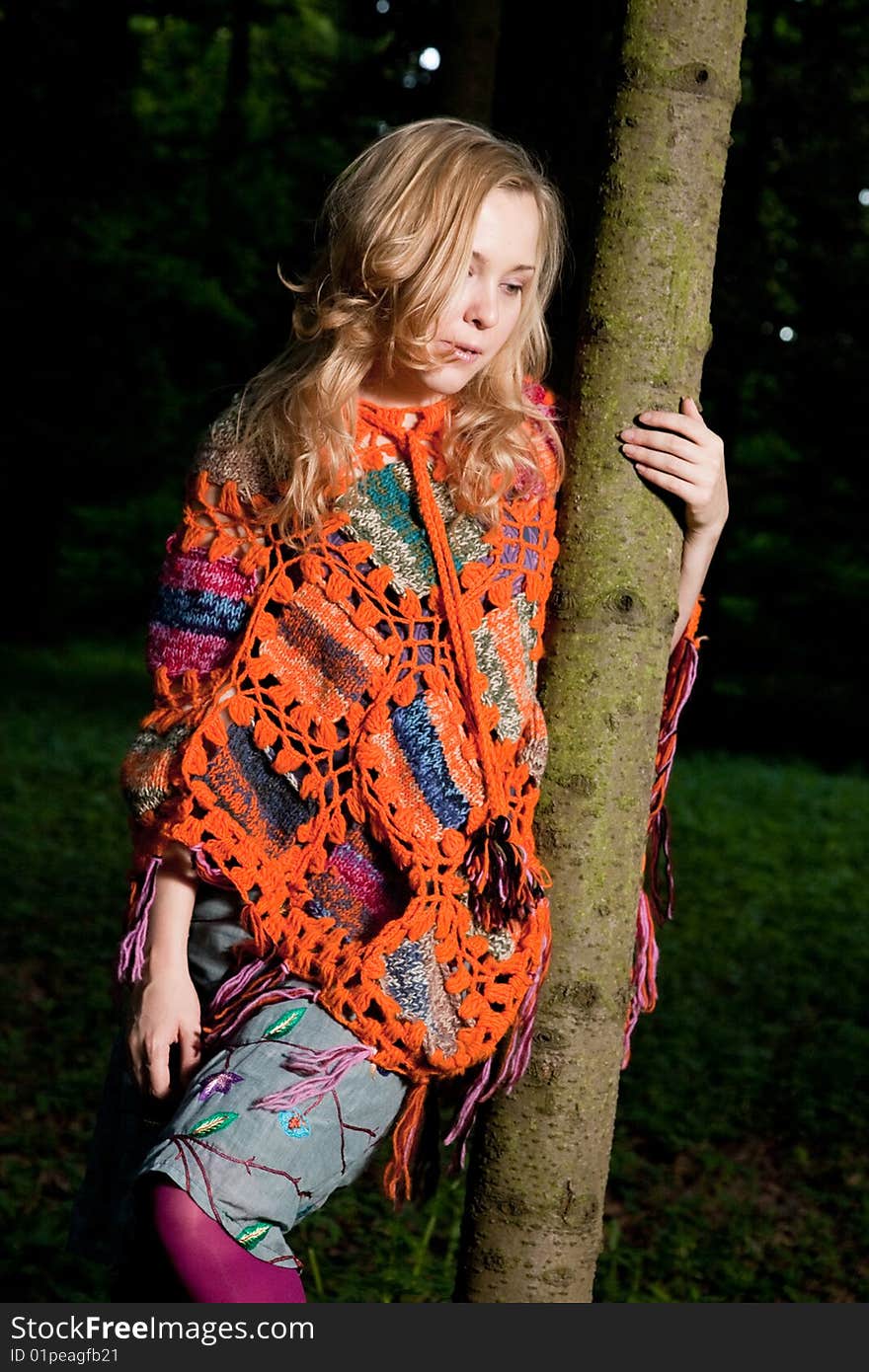 Young Woman Portrait Near The Tree