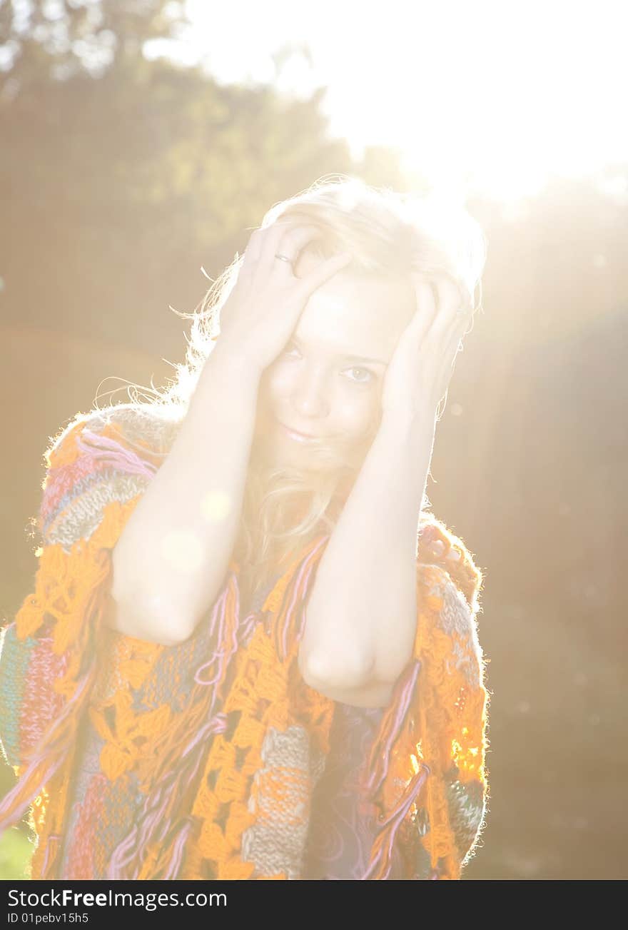 Backlit Portrait Of Young Pretty Woman