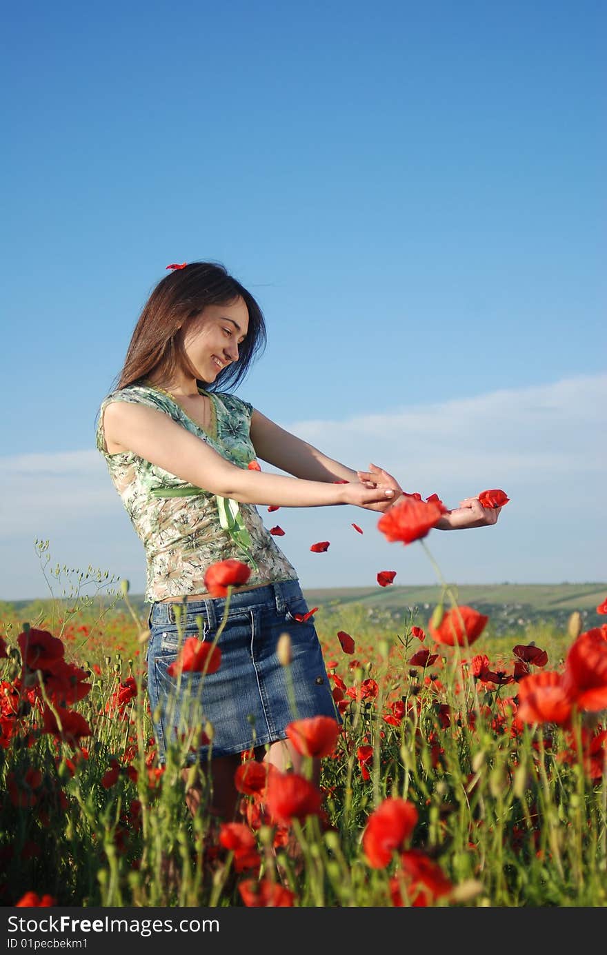 Girl On A Red Poppies Field