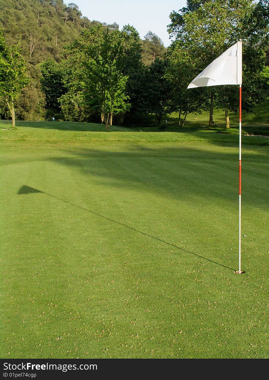 A flag at the 18 hole. A flag at the 18 hole