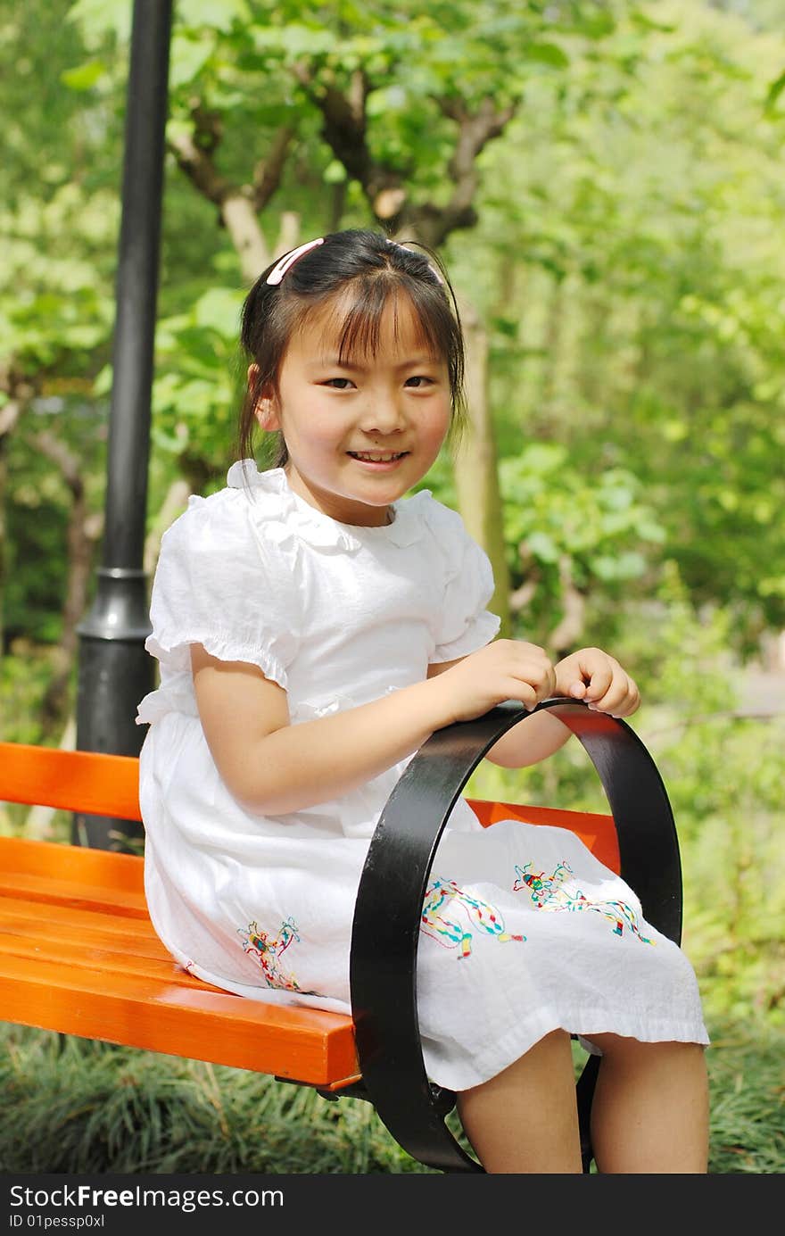 Beautiful little girl in white