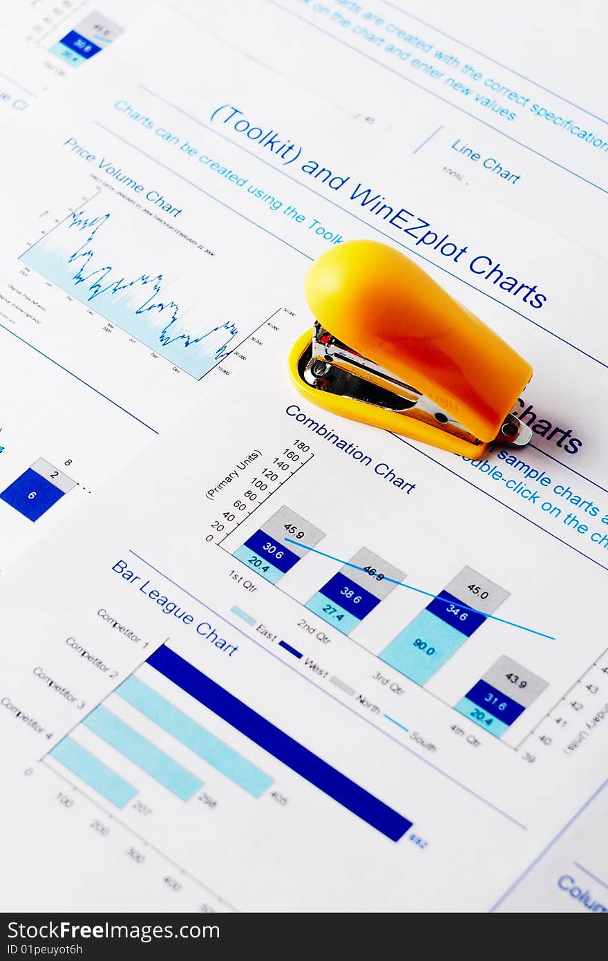 Small nice yellow stapler and charts. Small nice yellow stapler and charts