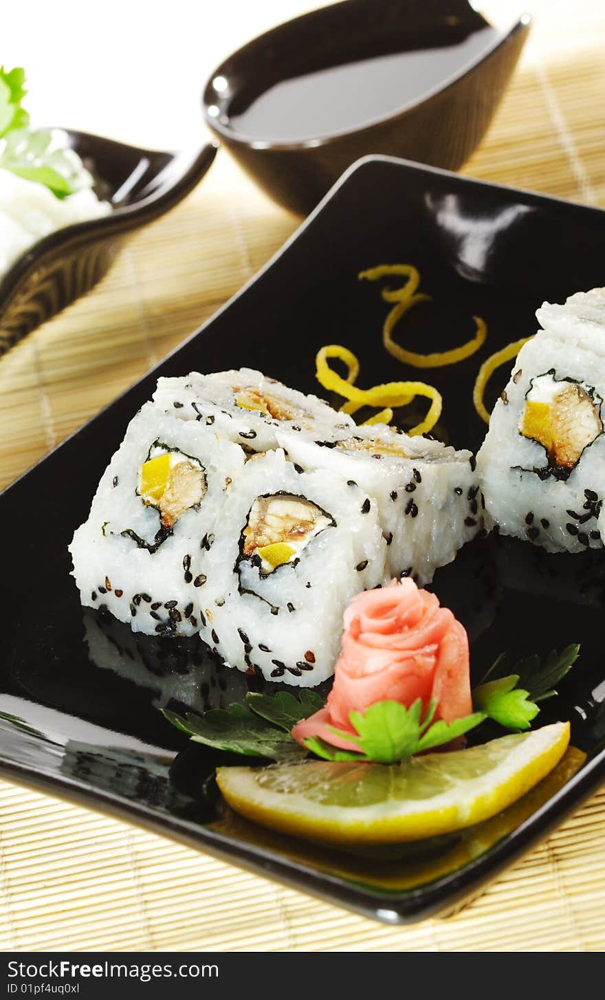 Japanese Cuisine - Sushi with Salad Leaf and Parsley