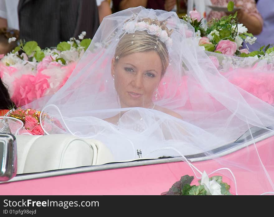 Young Fiancee Sits In A Machine Without A Roof