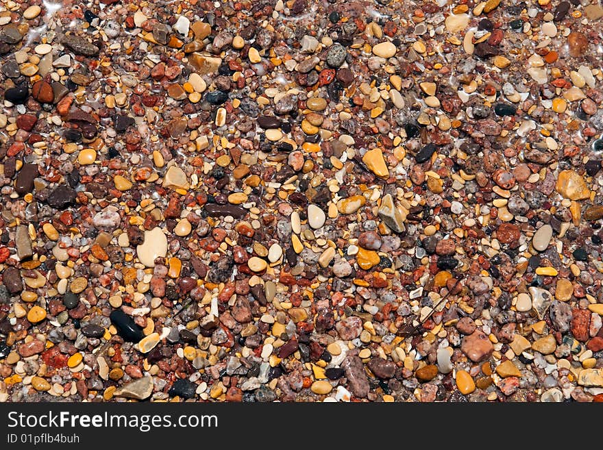 Wet pebbles, natural background texture